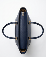 Bolso firme con efecto piel azul marino