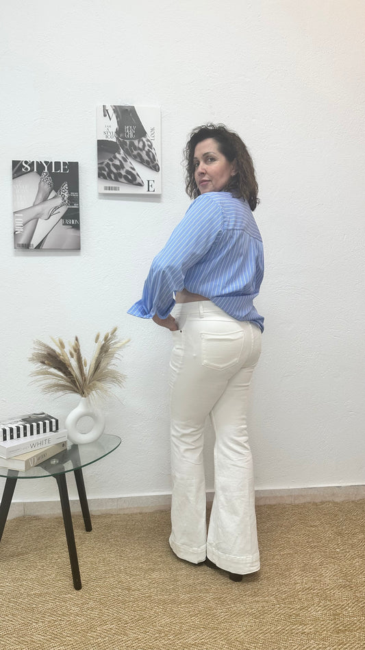 Camisa asimétrica de rayas azules y blancas con top incorporado