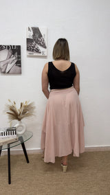 Falda midi rosa con cinturón trenzado